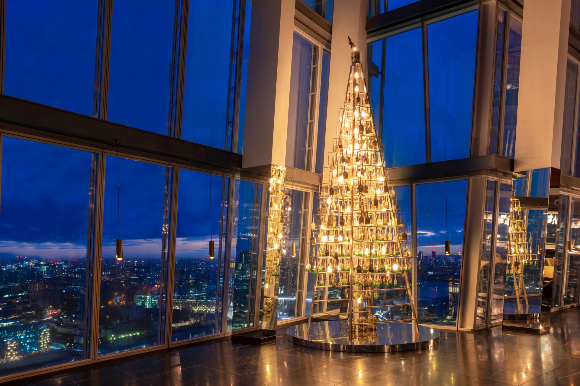 Aqua Shard Christmas tree lit up facing London City